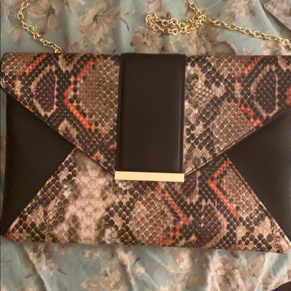Faux snakeskin clutch